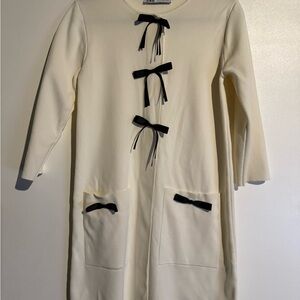Zara Cream Tunic with Black Bow Accents